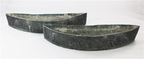 A pair of demi lune lead garden planters, L.4ft 2in.